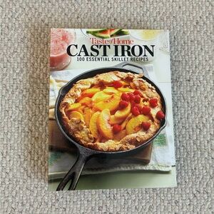 Taste of Home Cast Iron Cookbook with Red and Yellow Accents
